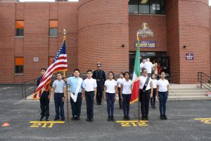 students standing with flags