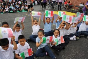 students holding flags